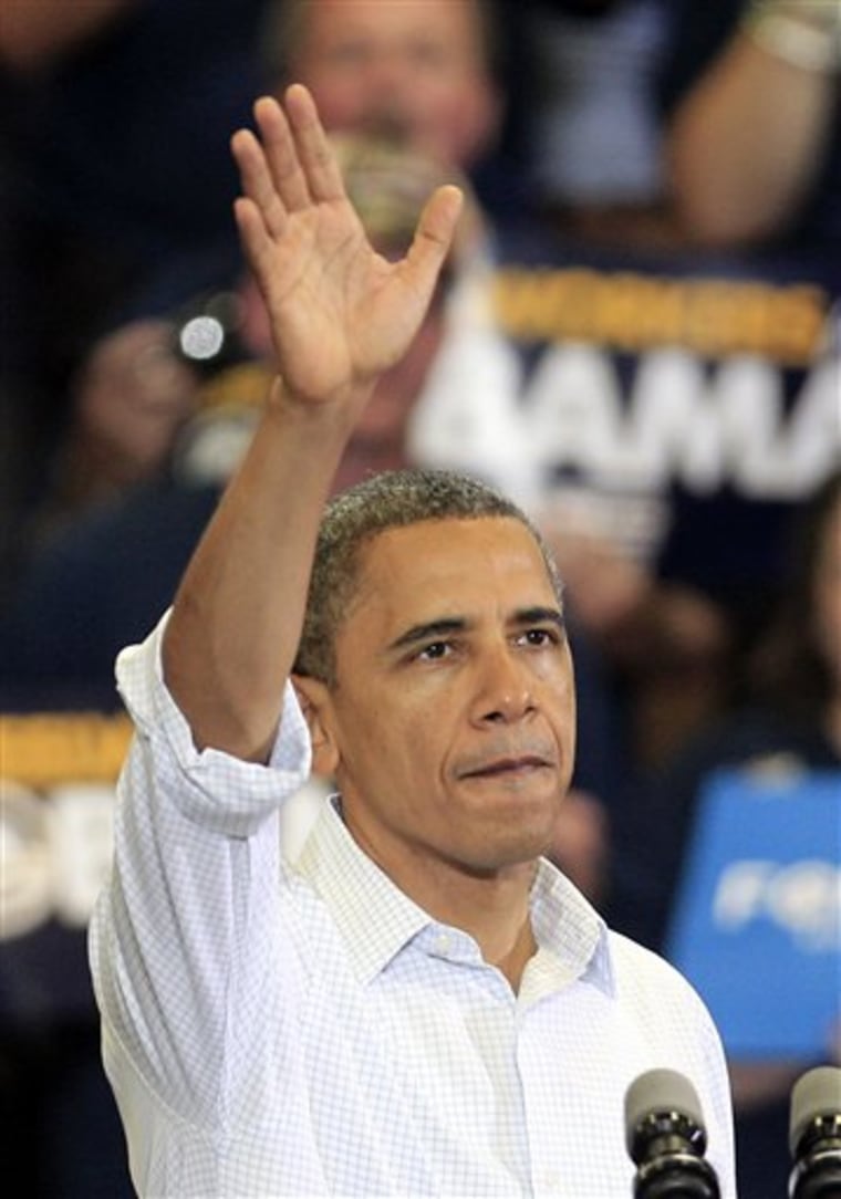 President Barack Obama waves to supporters after speaking at a campaign event at Scott High School Monday, Sept. 3, 2012, in Toledo, Ohio.